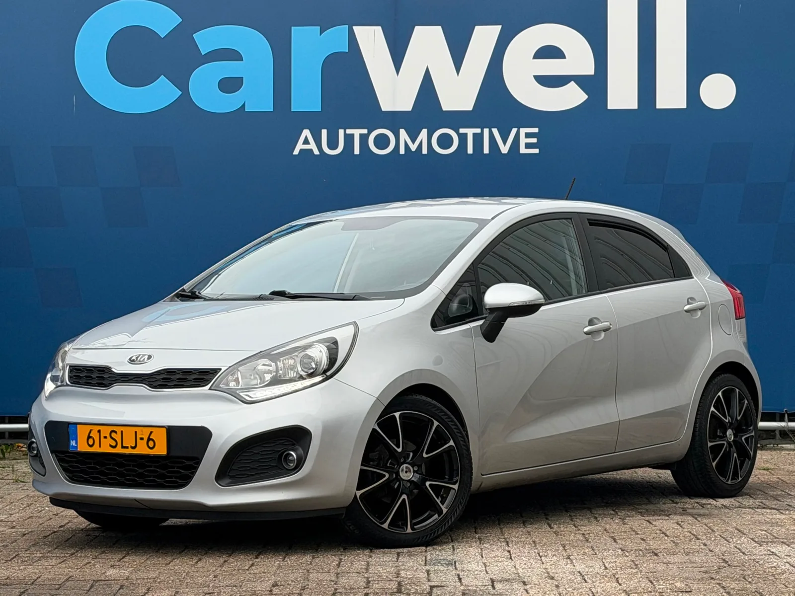 Kia Rio (2012) — foto 1