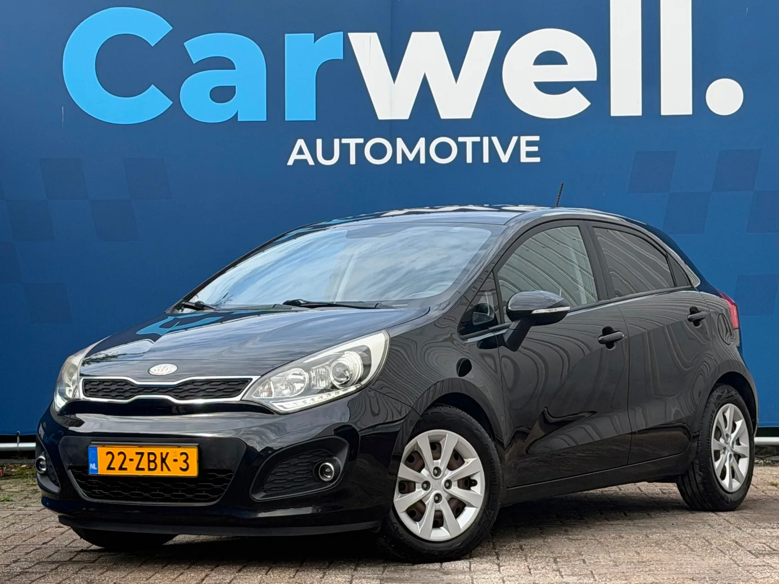 Kia Rio (2013) — foto 1