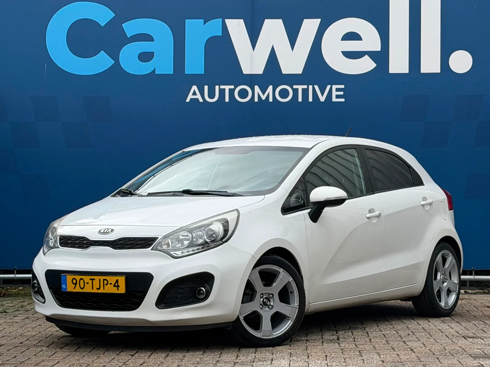 Kia Rio (2012) — foto 1