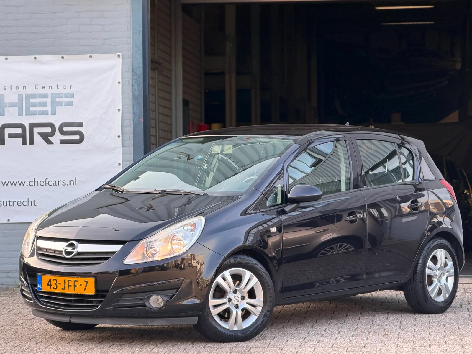 Opel Corsa (2009) — foto 1