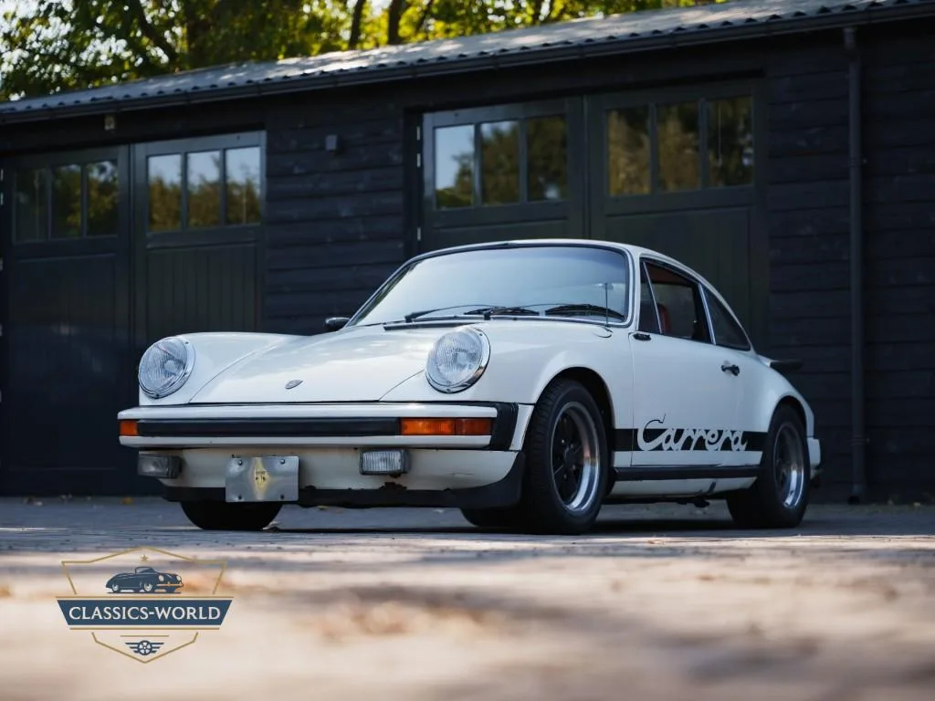 Porsche 911 (1975) — foto 1