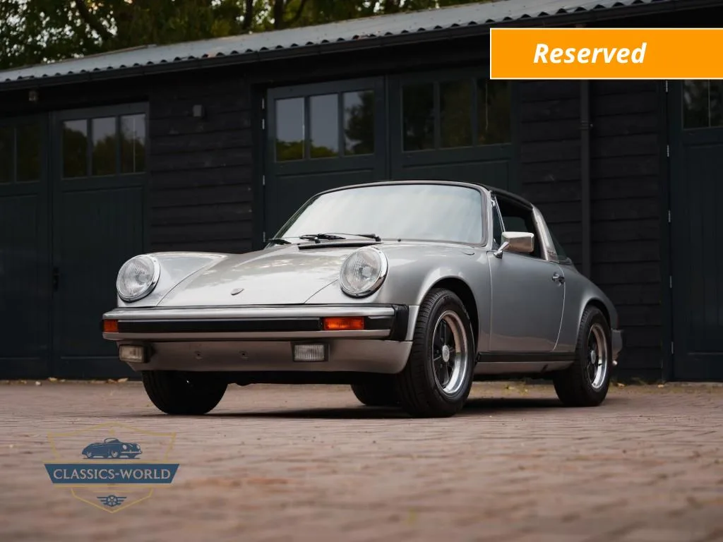Porsche 911 (1975) — foto 1