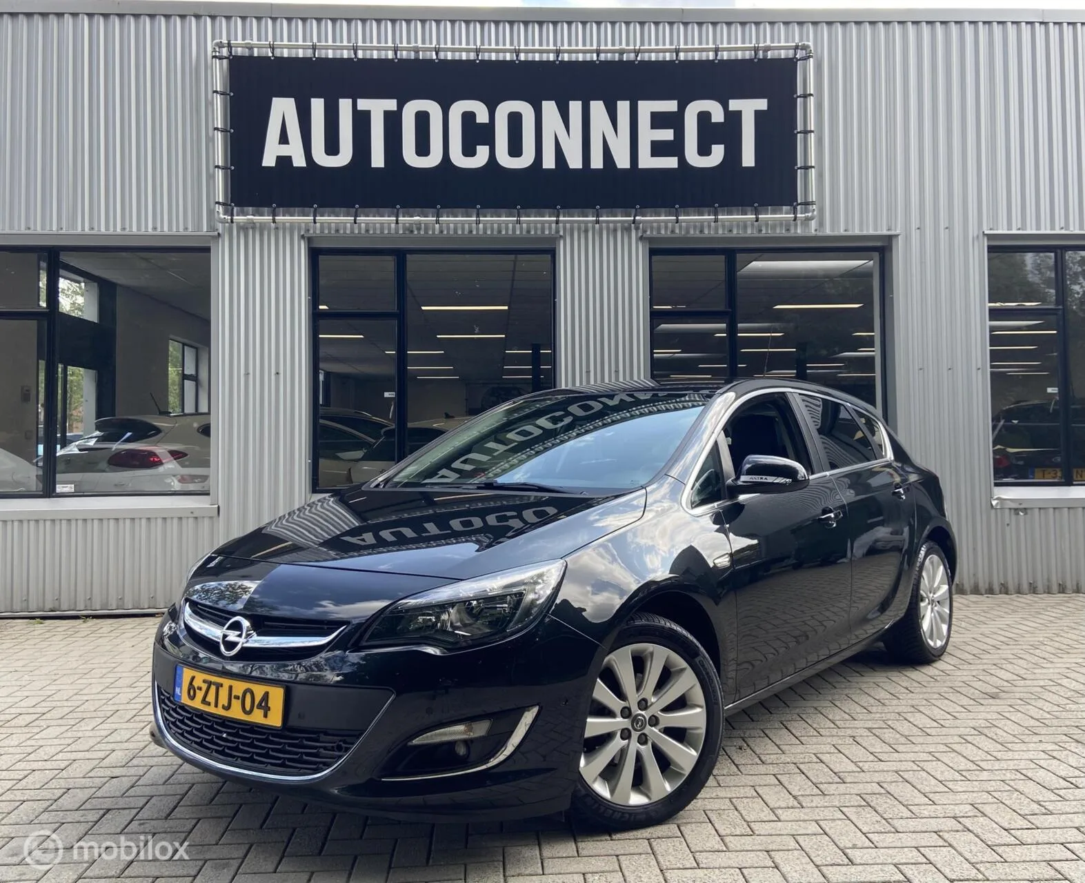 Opel Astra (2014) — foto 1