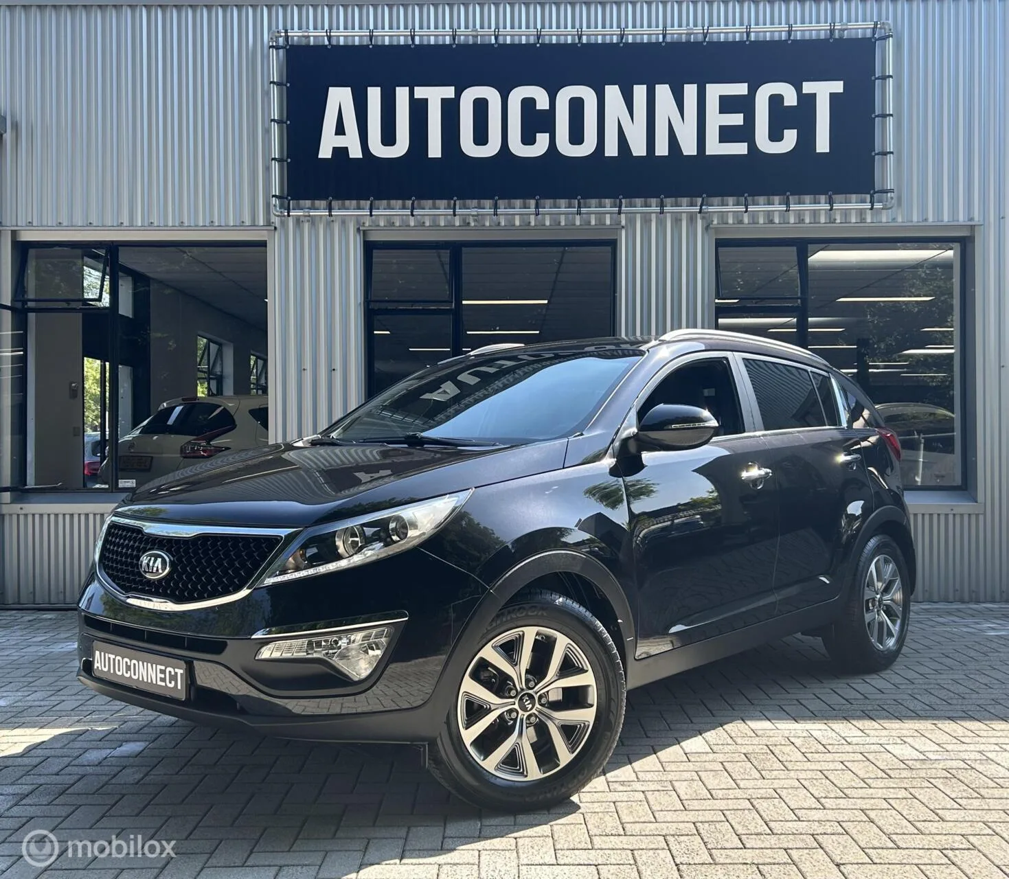Kia Sportage (2015) — foto 1