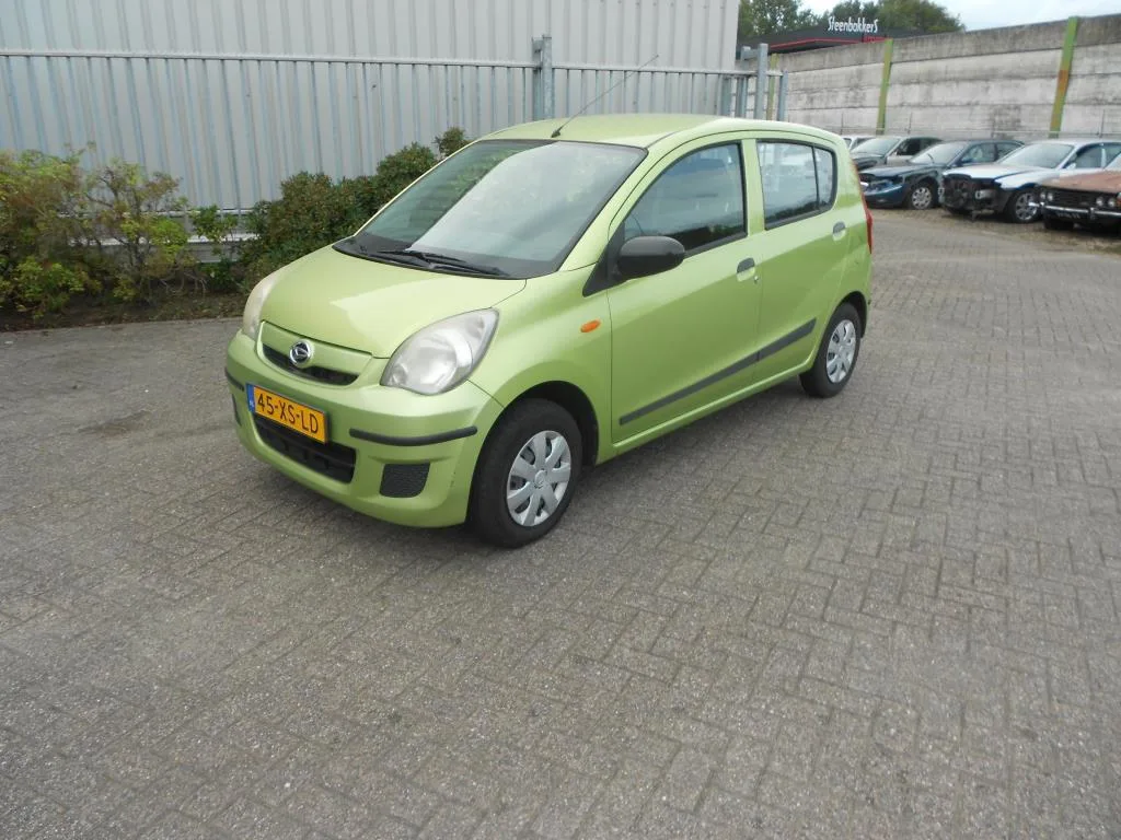 Daihatsu Cuore (2007) — foto 1