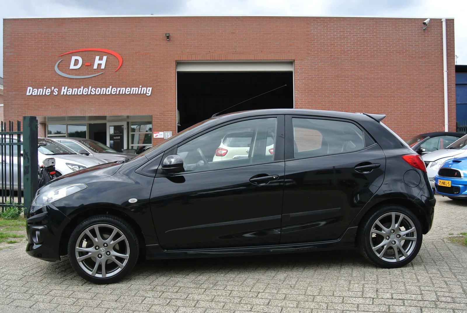 Mazda 2 (2009) — foto 1
