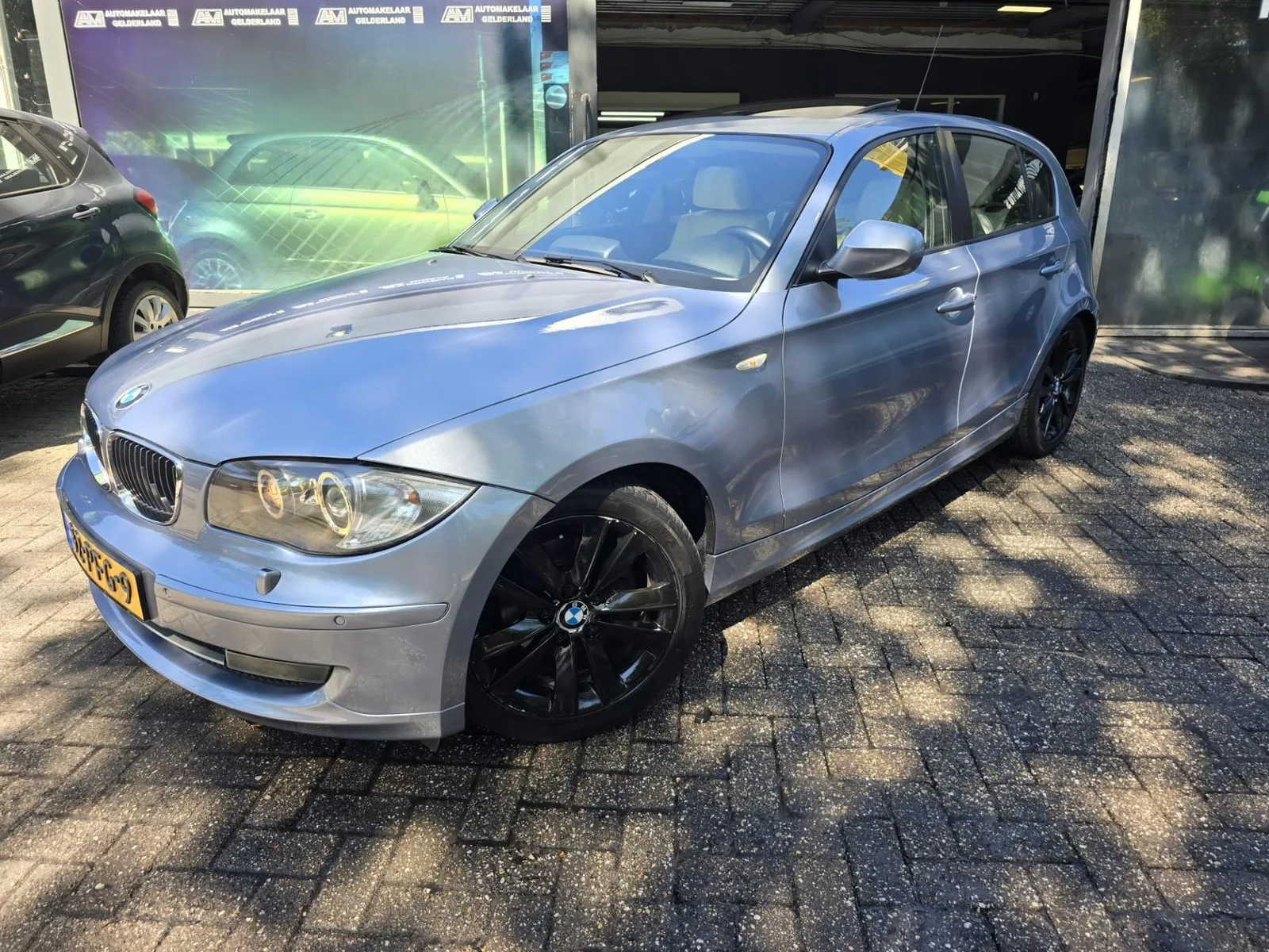 BMW 1-Serie (2011) — foto 1
