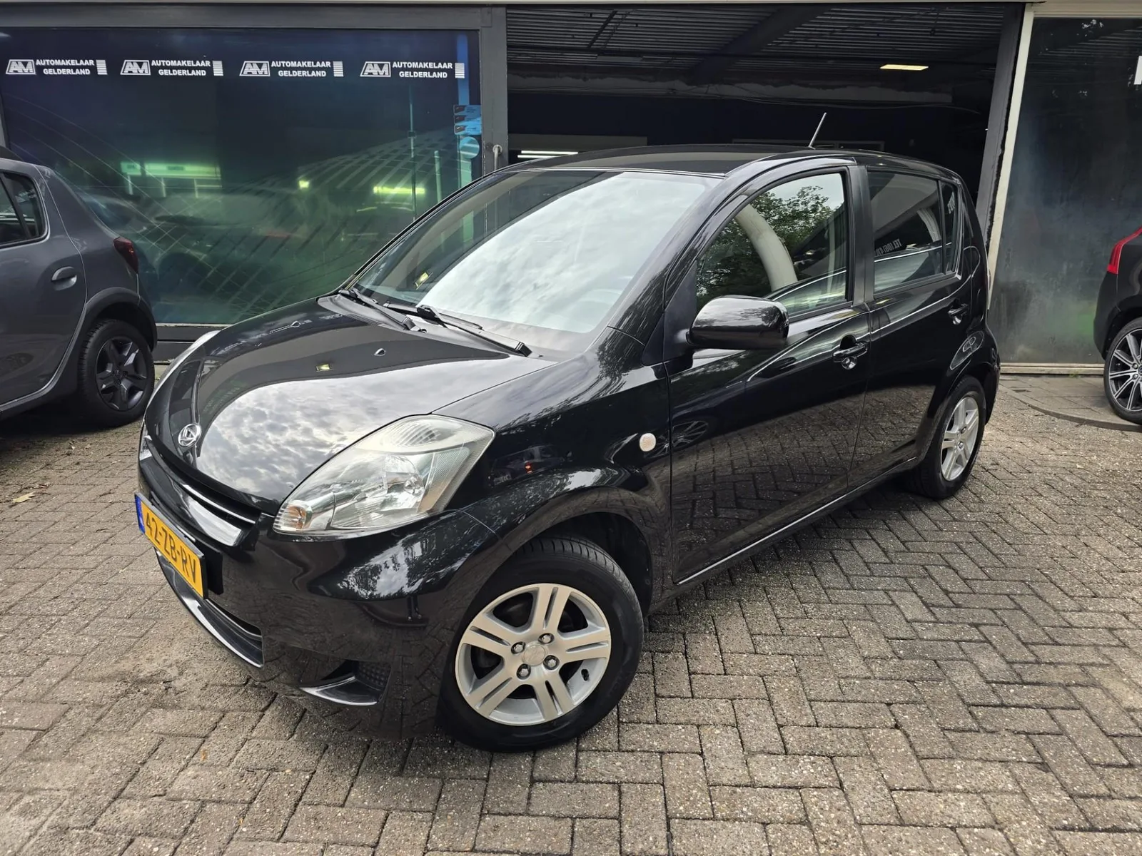 Daihatsu Sirion (2008) — foto 1