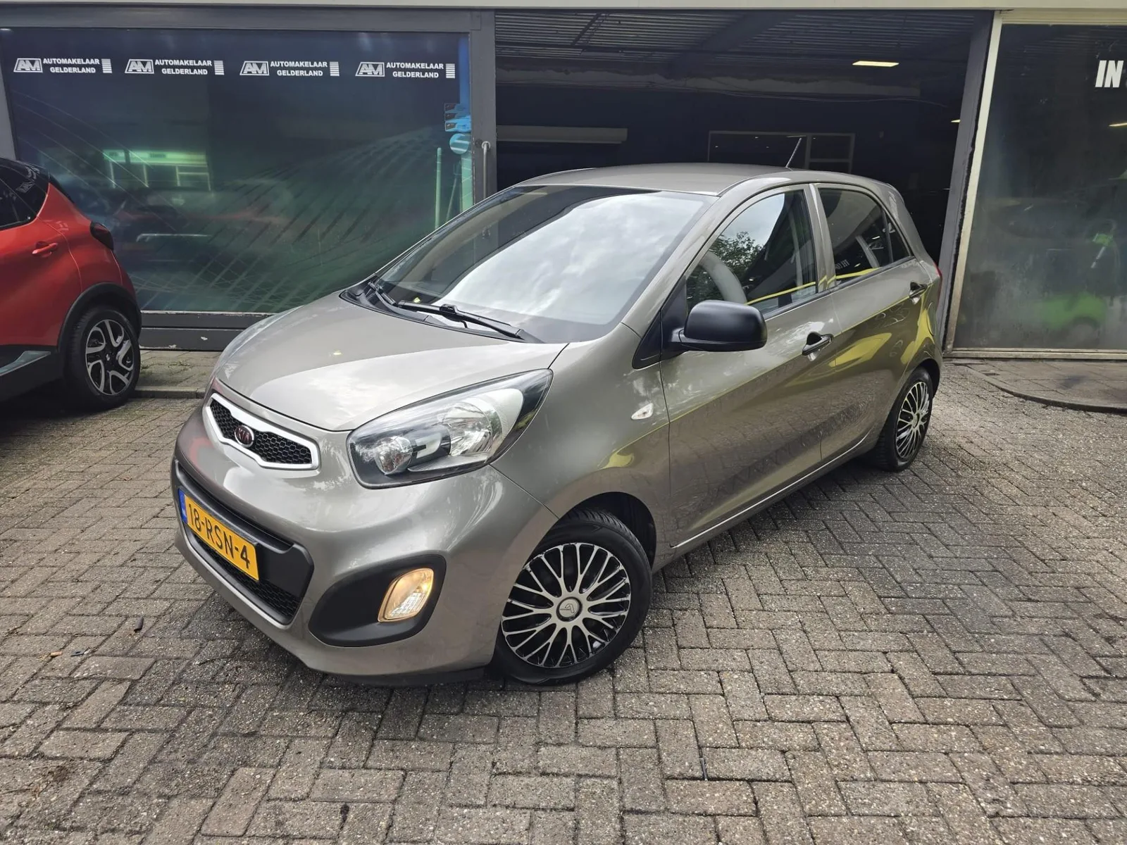 Kia Picanto (2011) — foto 1