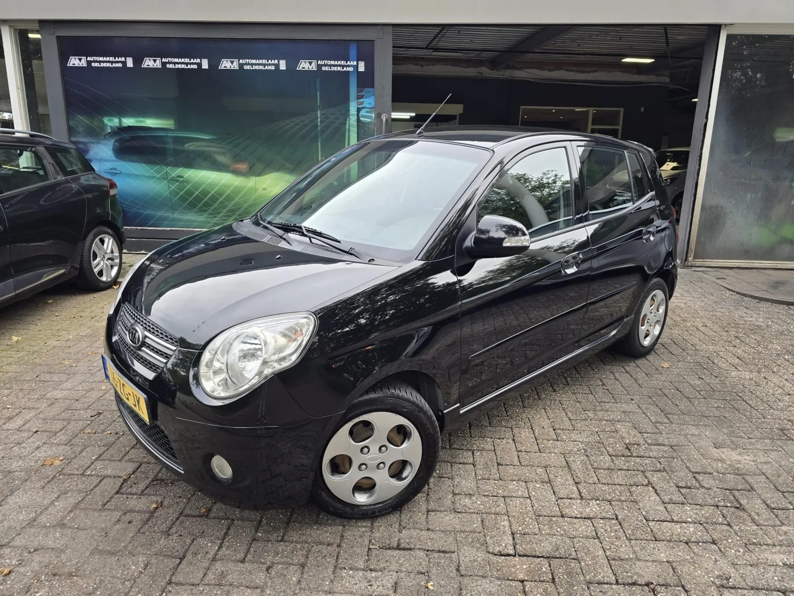 Kia Picanto (2008) — foto 1