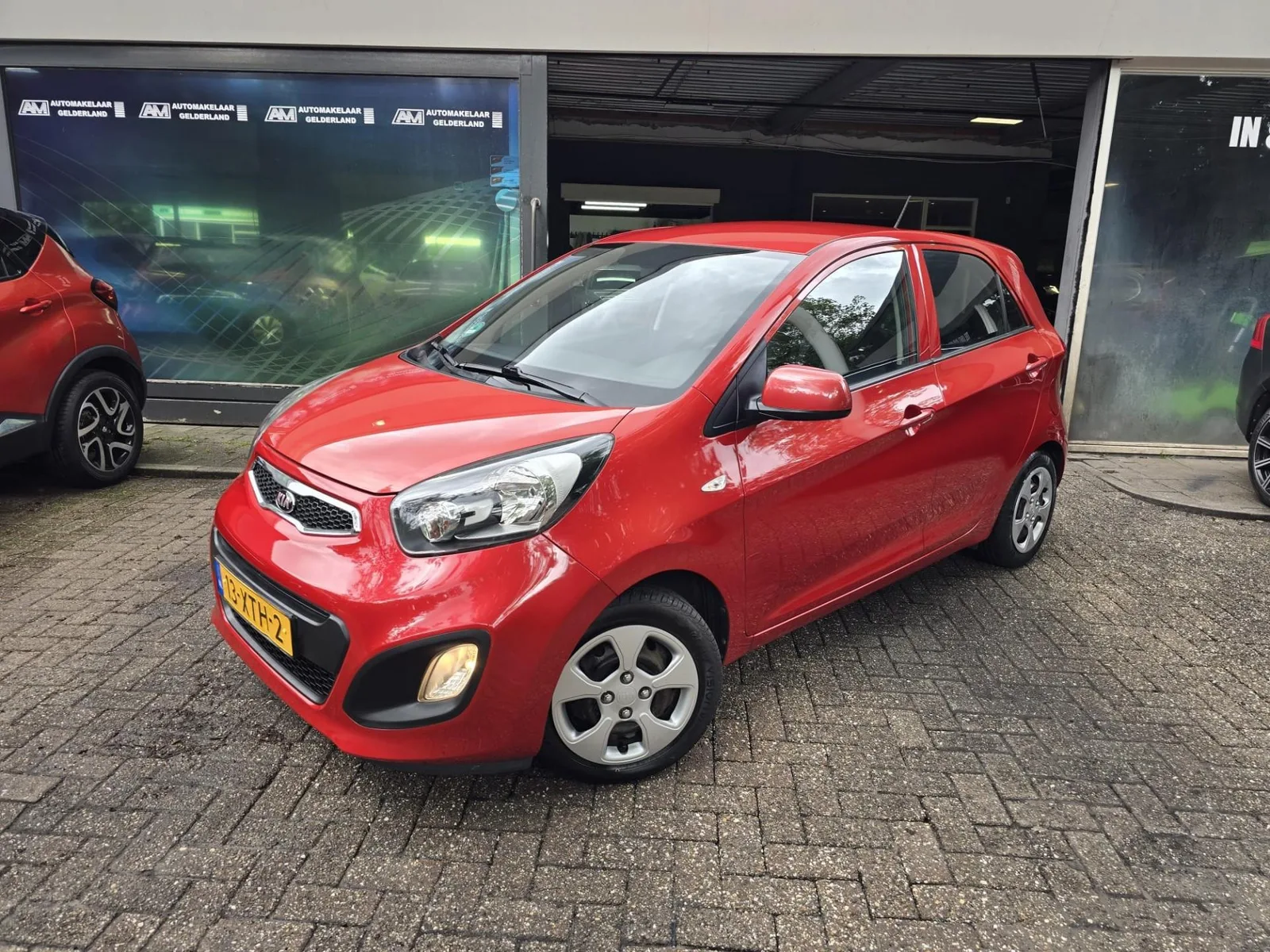 Kia Picanto (2012) — foto 1