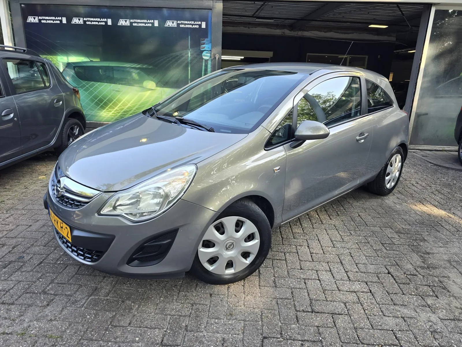 Opel Corsa (2011) — foto 1