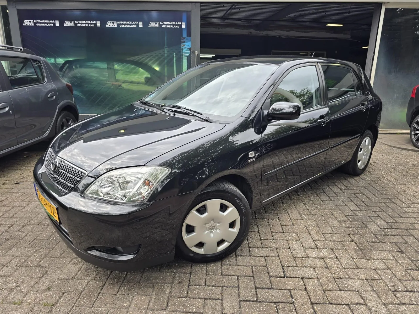 Toyota Corolla (2003) — foto 1