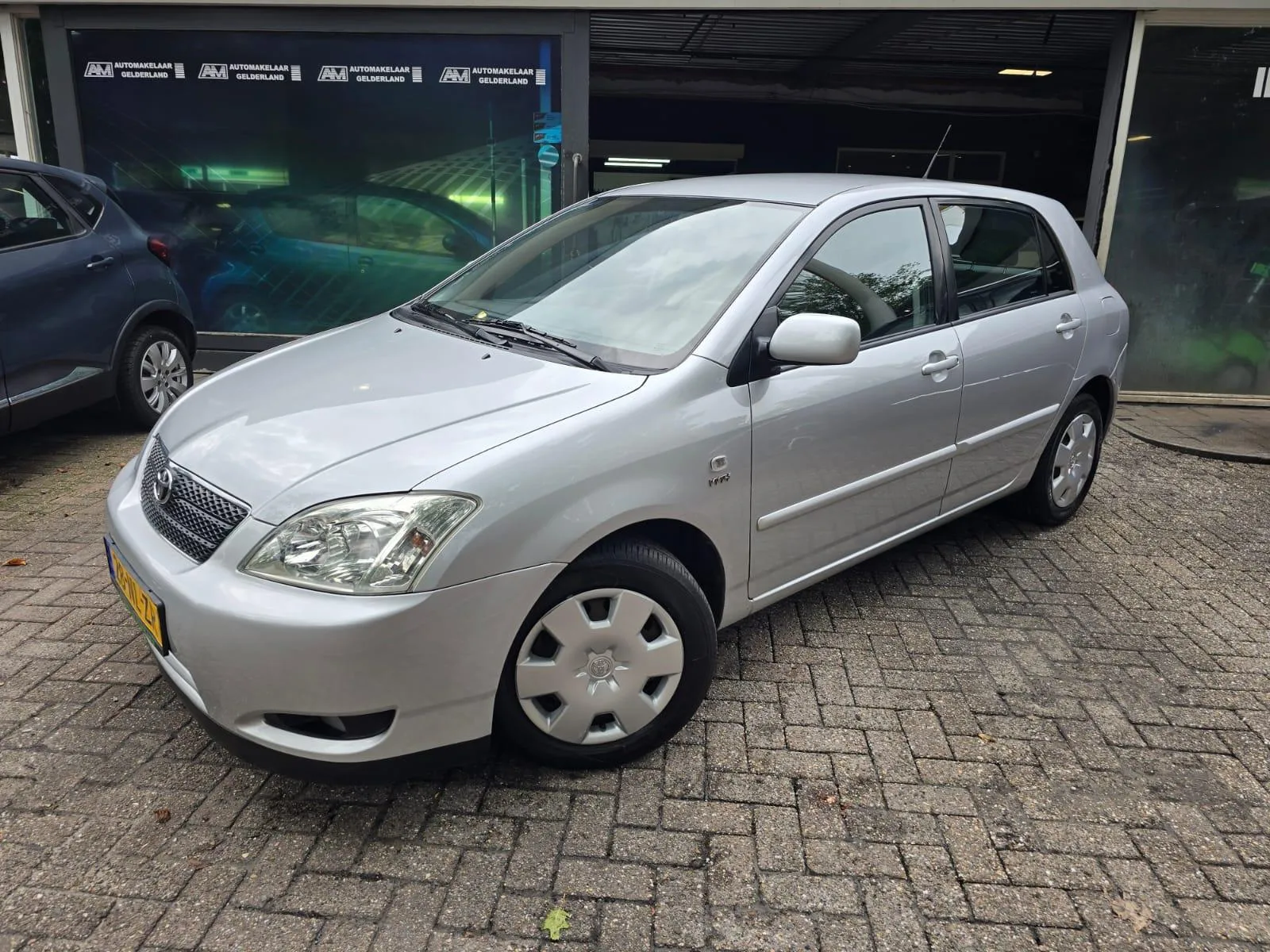 Toyota Corolla (2003) — foto 1