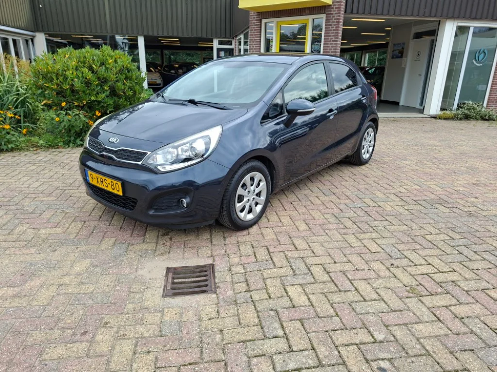 Kia Rio (2014) — foto 1