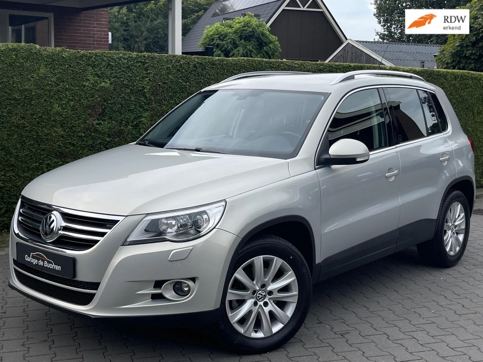 Volkswagen Tiguan (2010) — foto 1
