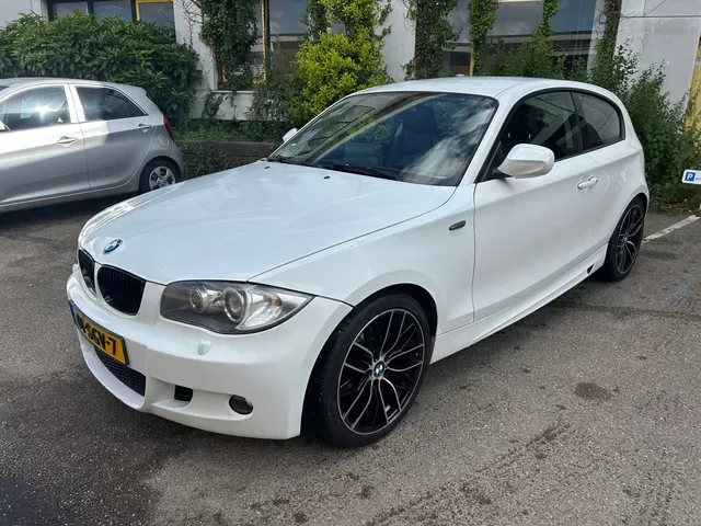 BMW 1-Serie (2011) — foto 1