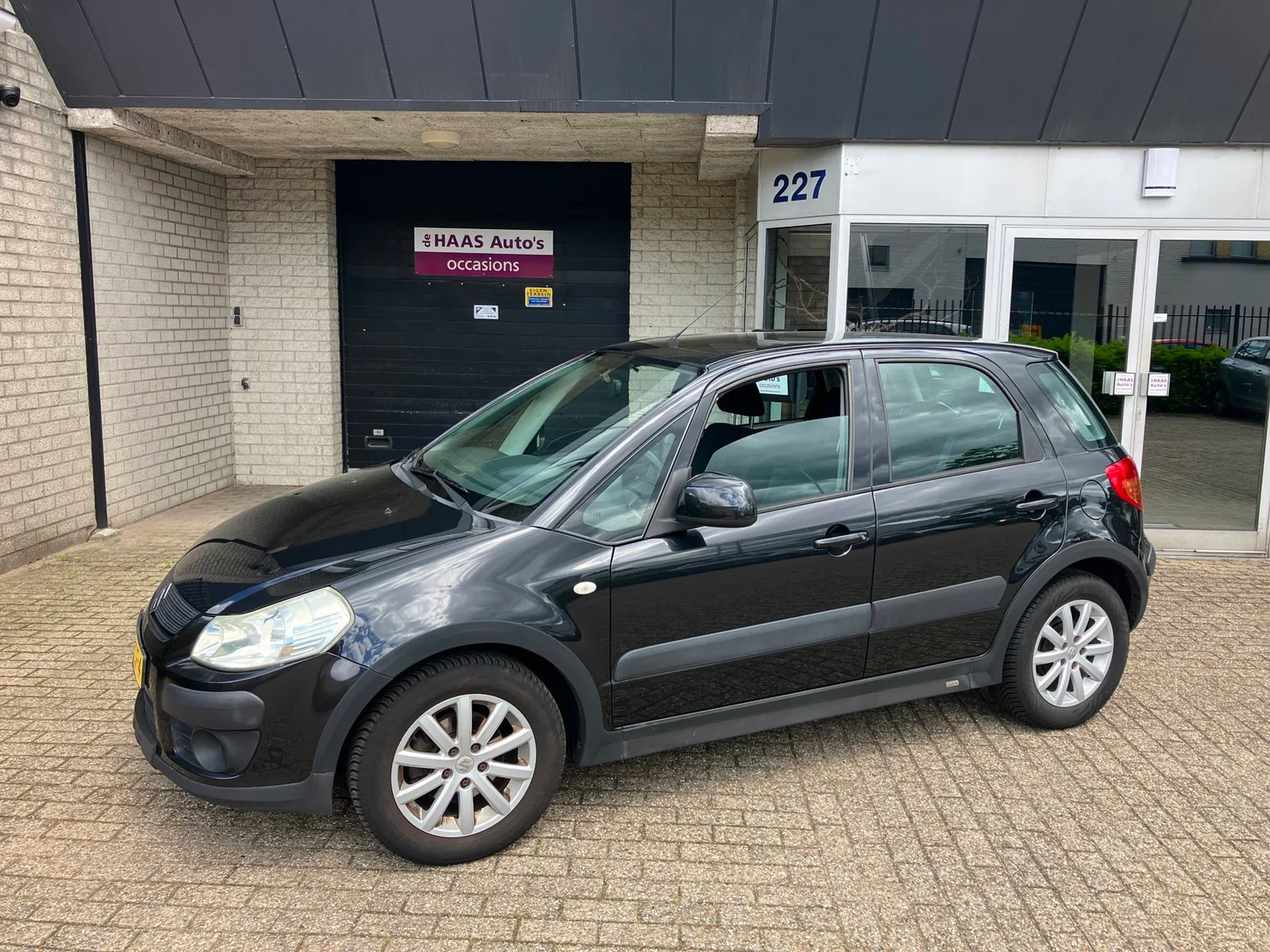 Suzuki SX4 (2008) — foto 1
