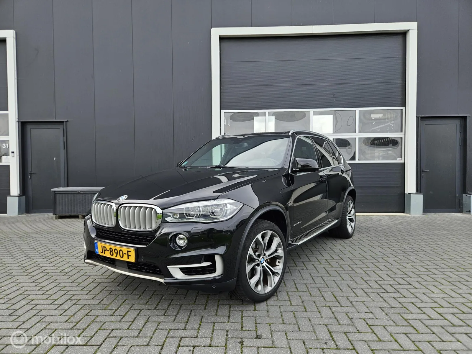 BMW X5 (2015) — foto 1