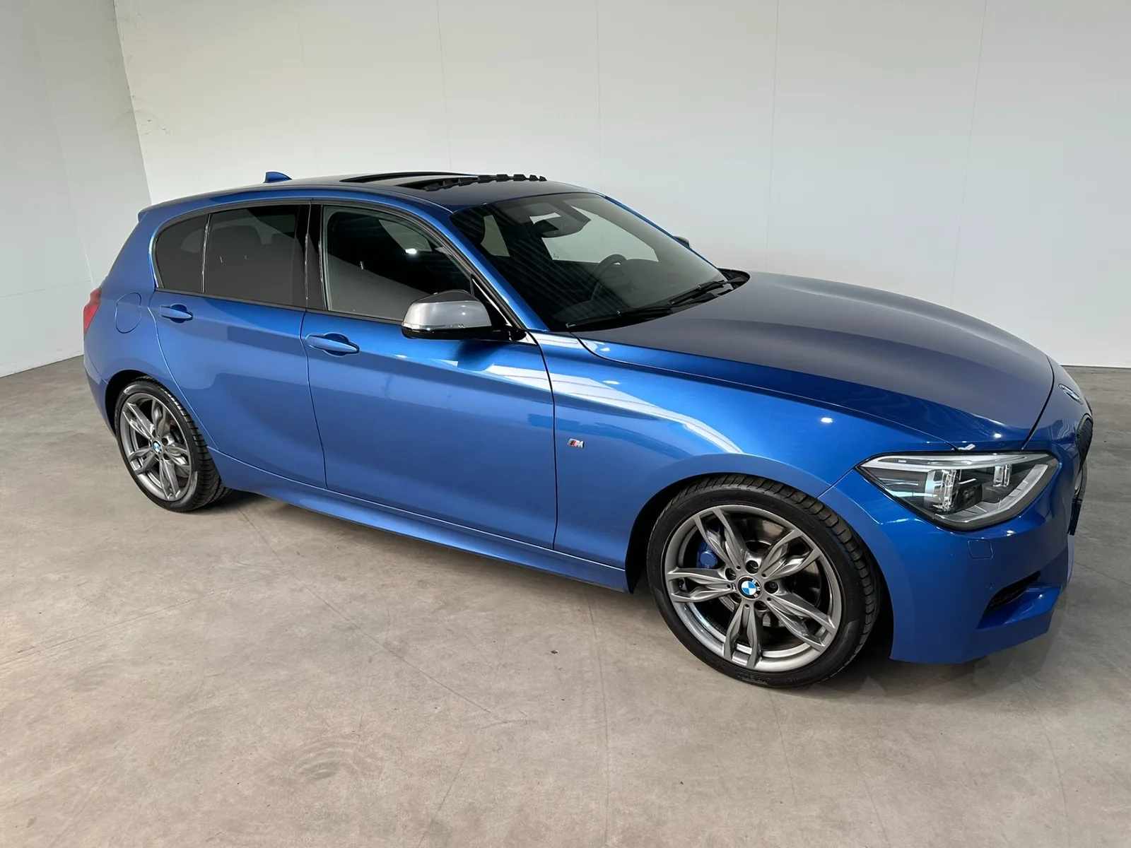 BMW 1-Serie (2012) — foto 1