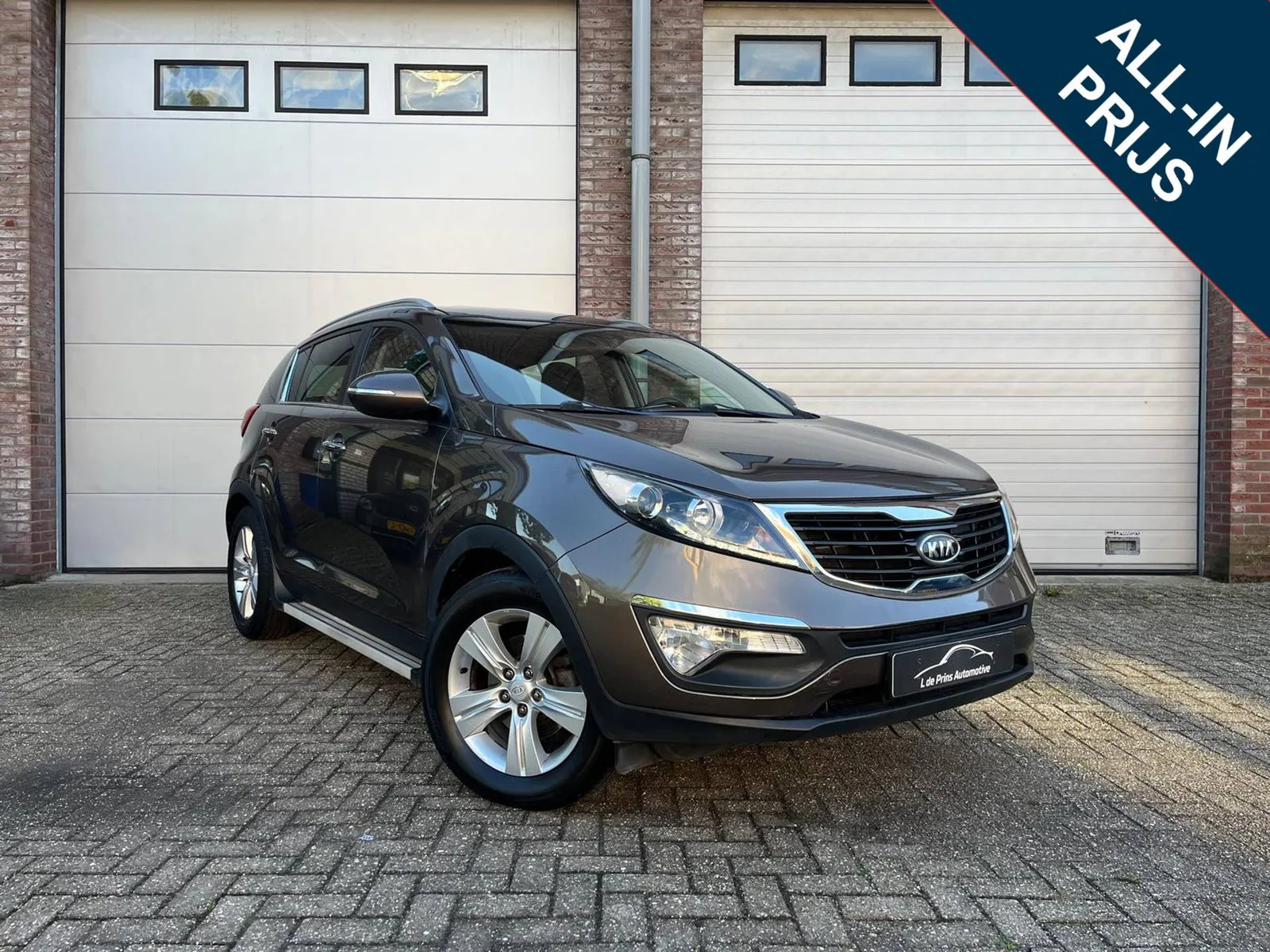 Kia Sportage (2011) — foto 1