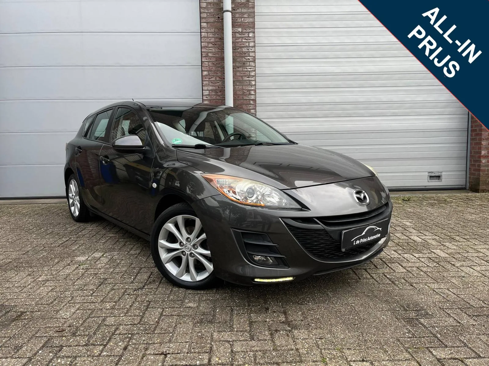 Mazda 3 (2009) — foto 1