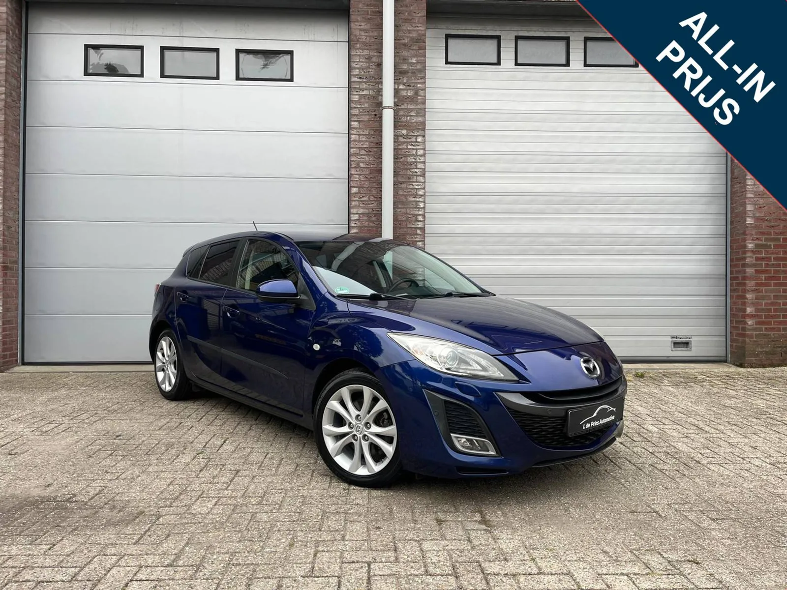 Mazda 3 (2011) — foto 1