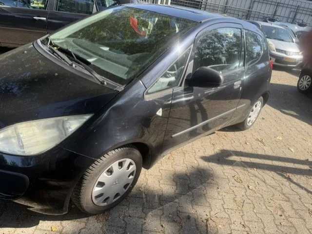 Mitsubishi Colt (2008) — foto 1