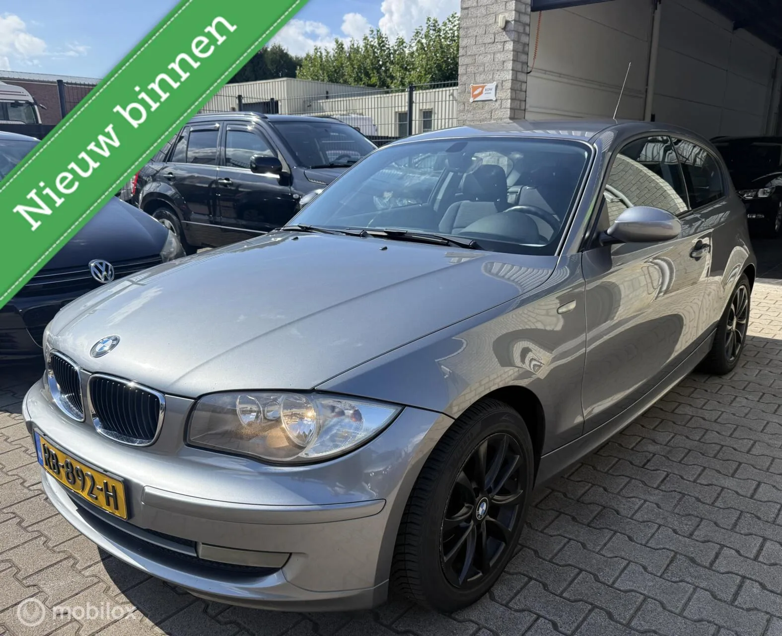 BMW 1-Serie (2009) — foto 1