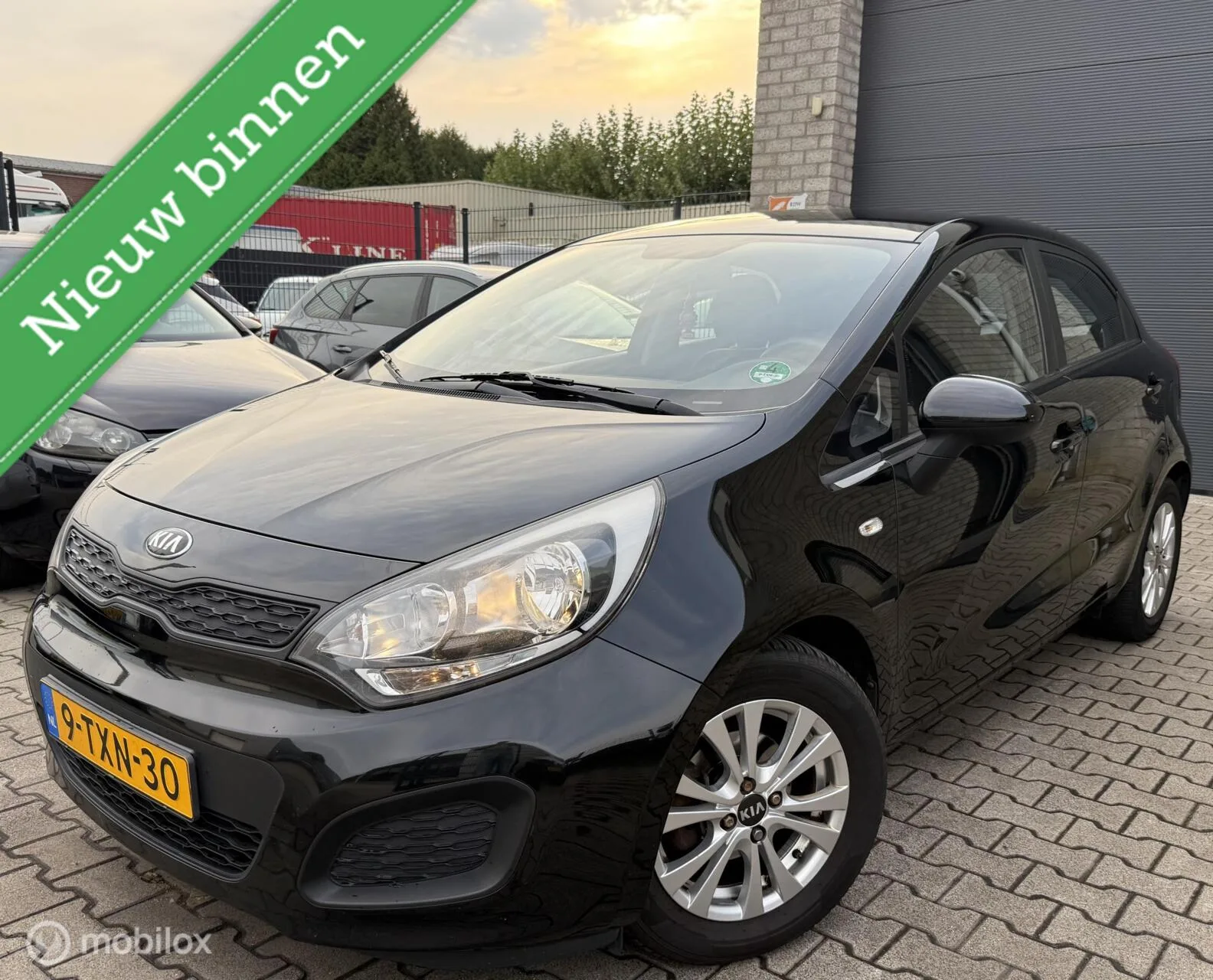 Kia Rio (2014) — foto 1