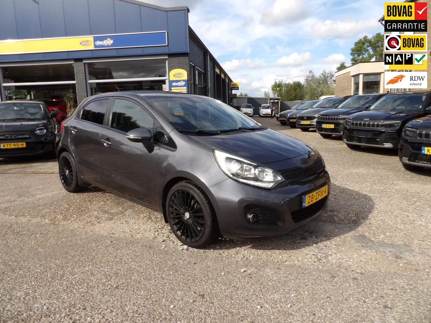 Kia Rio (2012) — foto 1