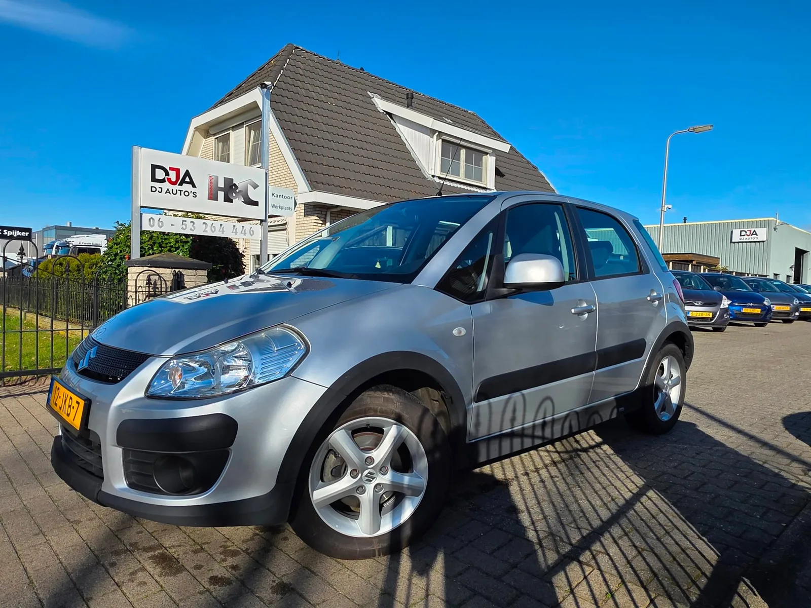 Suzuki SX4 (2009) — foto 1