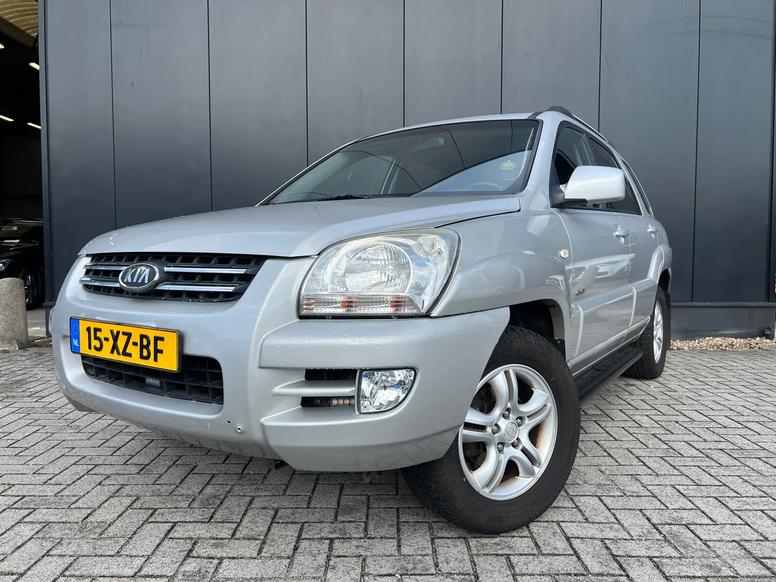 Kia Sportage (2008) — foto 1