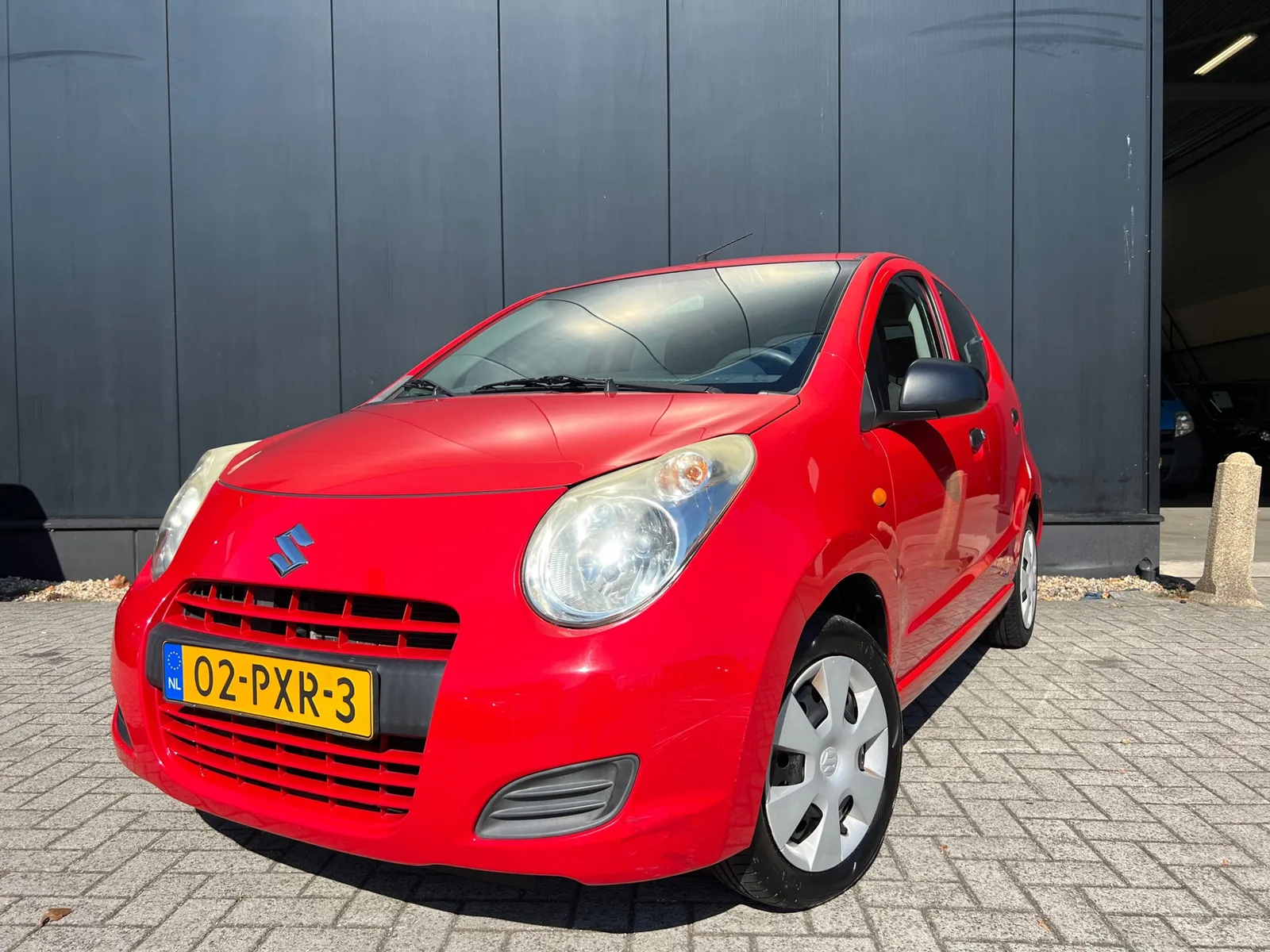 Suzuki Alto (2011) — foto 1