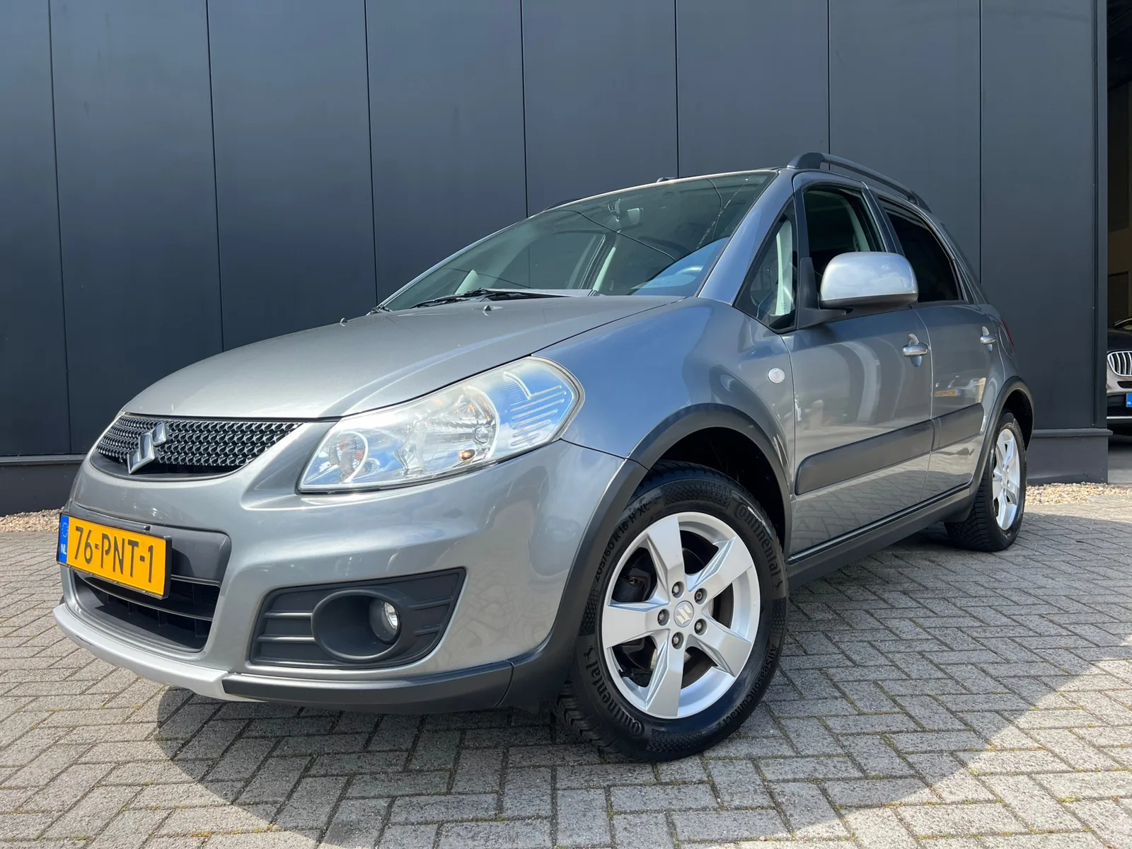Uniek! Suzuki SX4 (2011) — foto 1