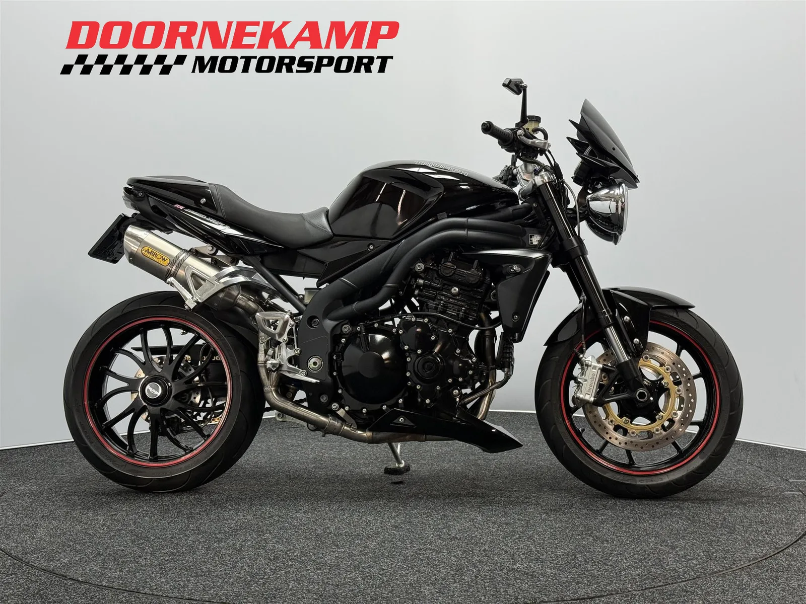 Triumph Speed Triple 1050 (2011) — foto 1