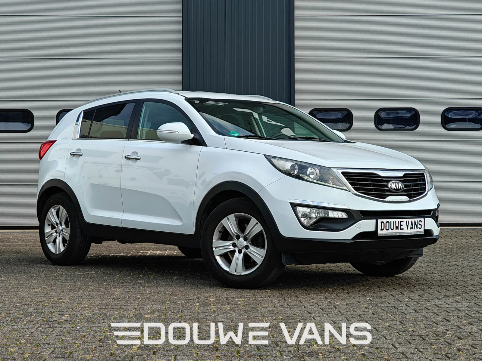 Kia Sportage (2014) — foto 1