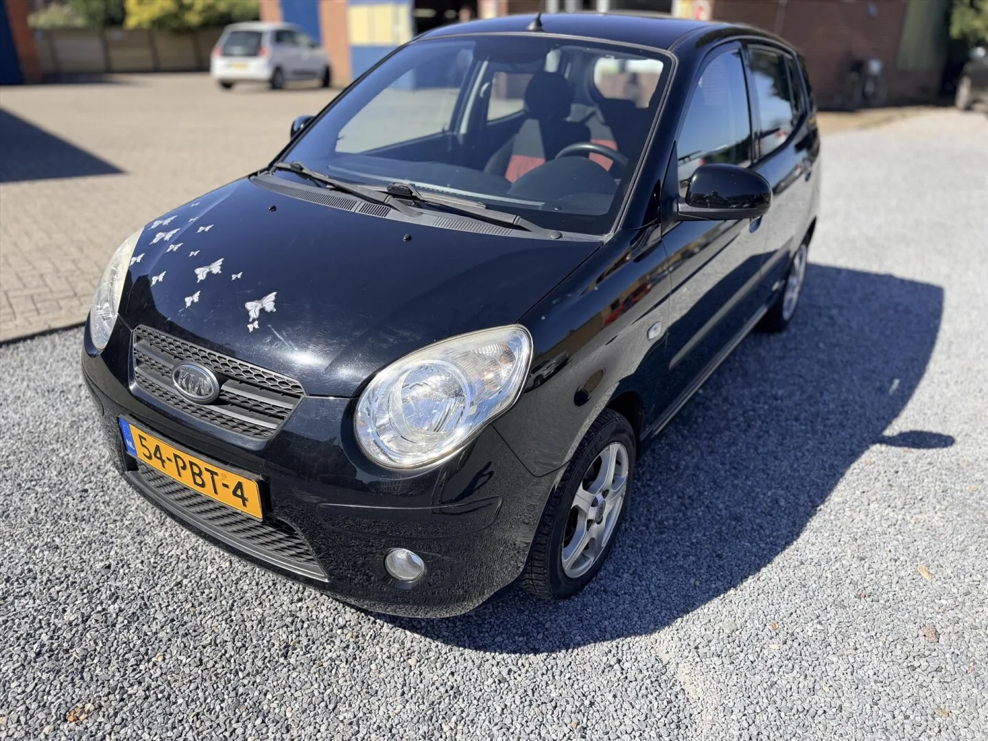 Kia Picanto (2011) — foto 1