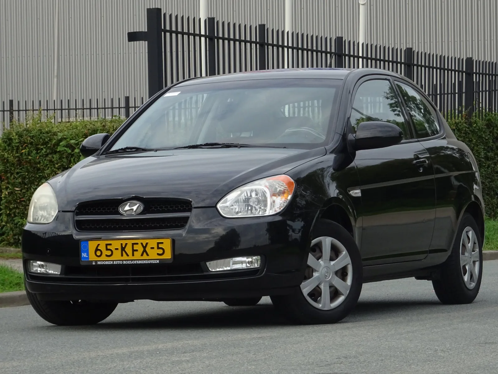 Hyundai Accent (2009) — foto 1