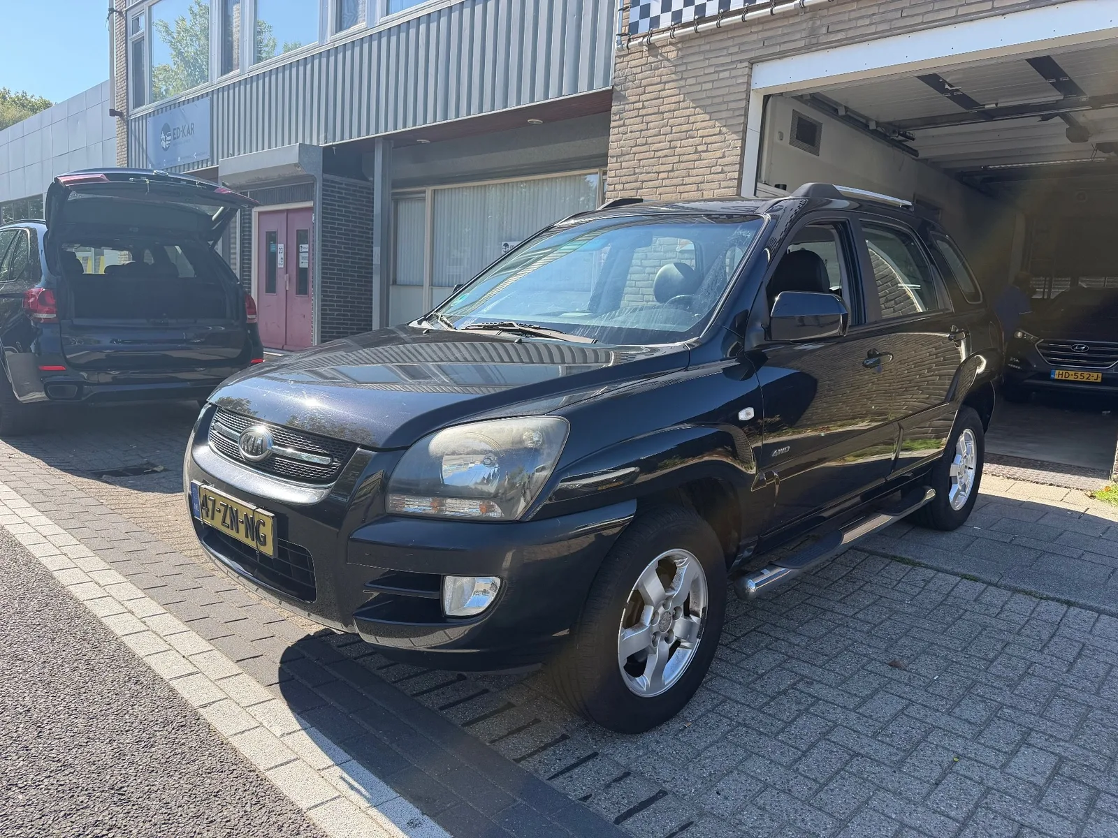 Kia Sportage (2008) — foto 1
