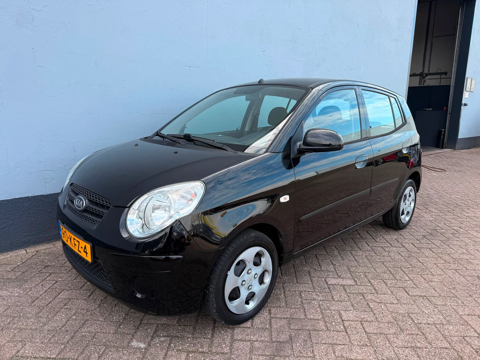 Kia Picanto (2009) — foto 1