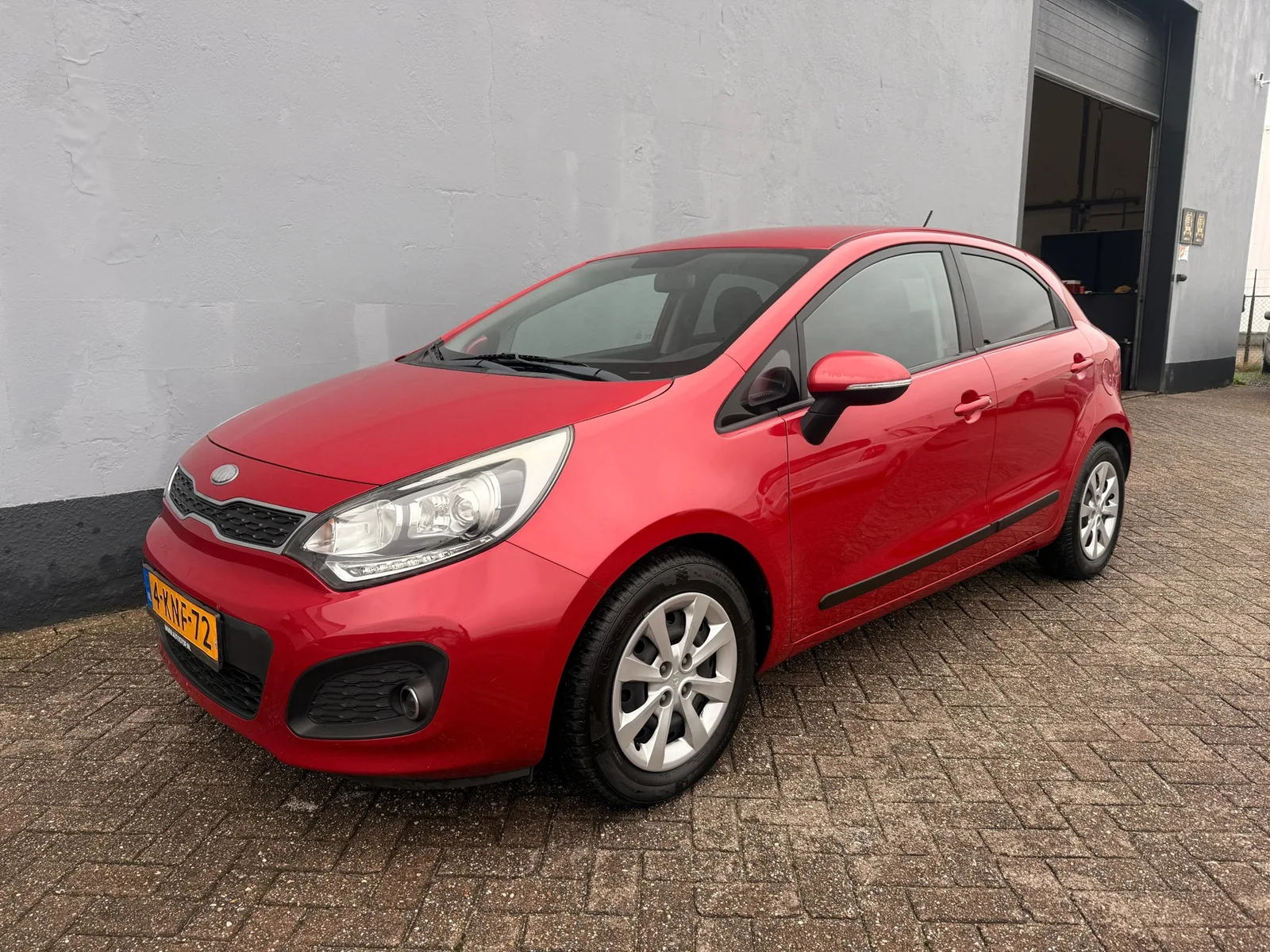 Kia Rio (2013) — foto 1