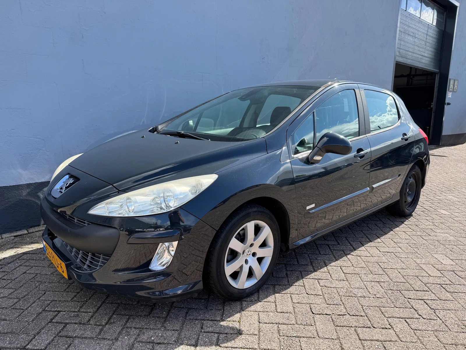 Peugeot 308 (2011) — foto 1