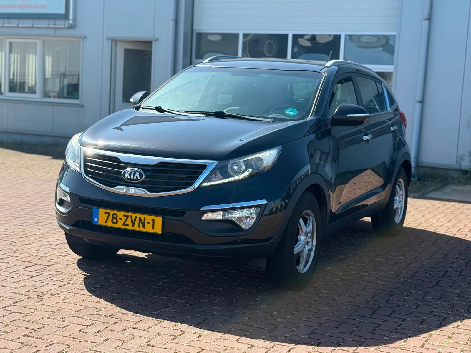 Kia Sportage (2013) — foto 1