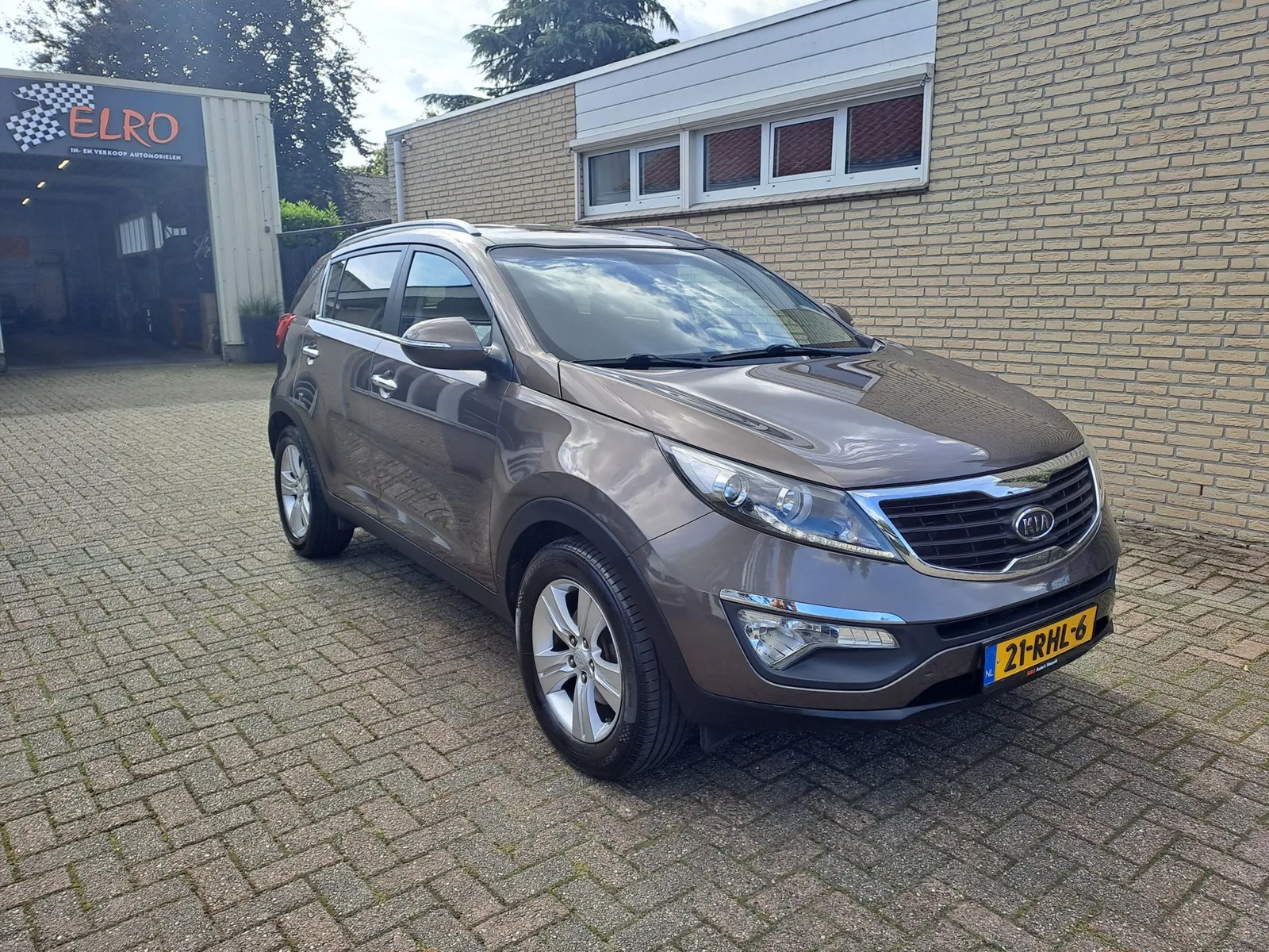 Kia Sportage (2011) — foto 1