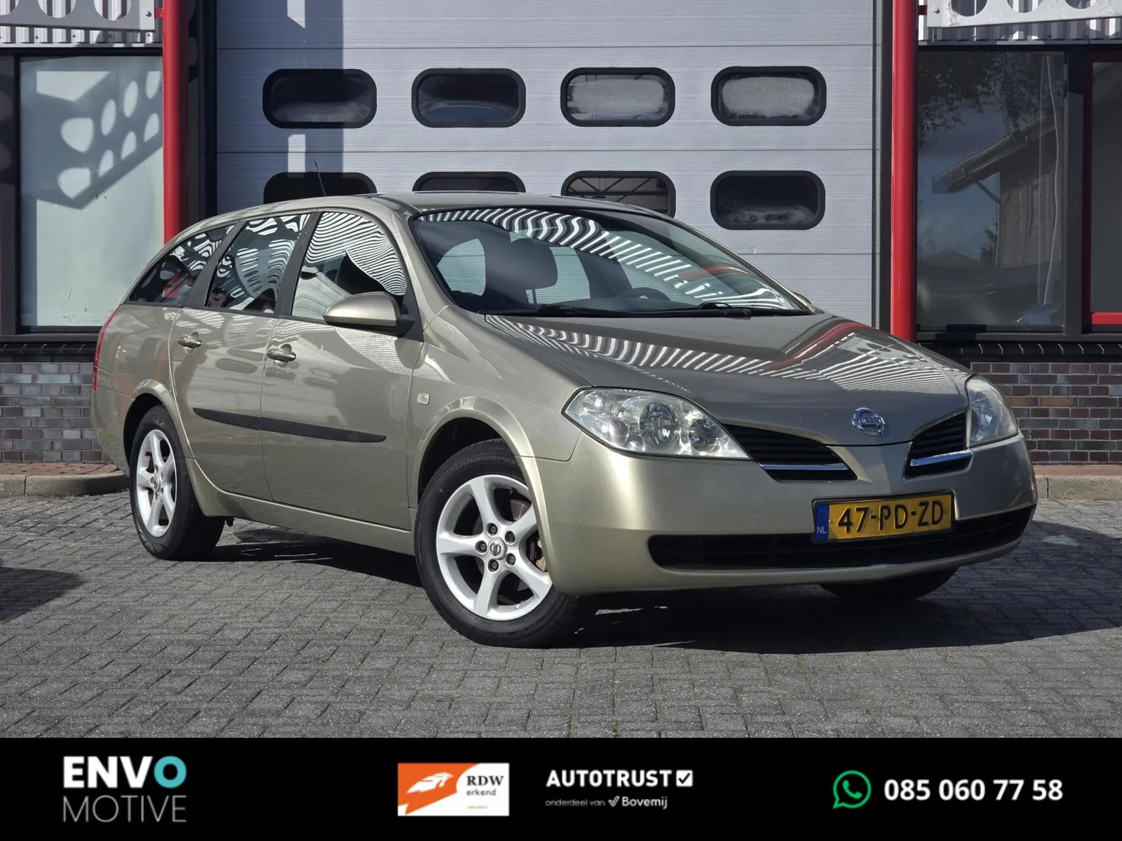 Nissan Primera (2004) — foto 1