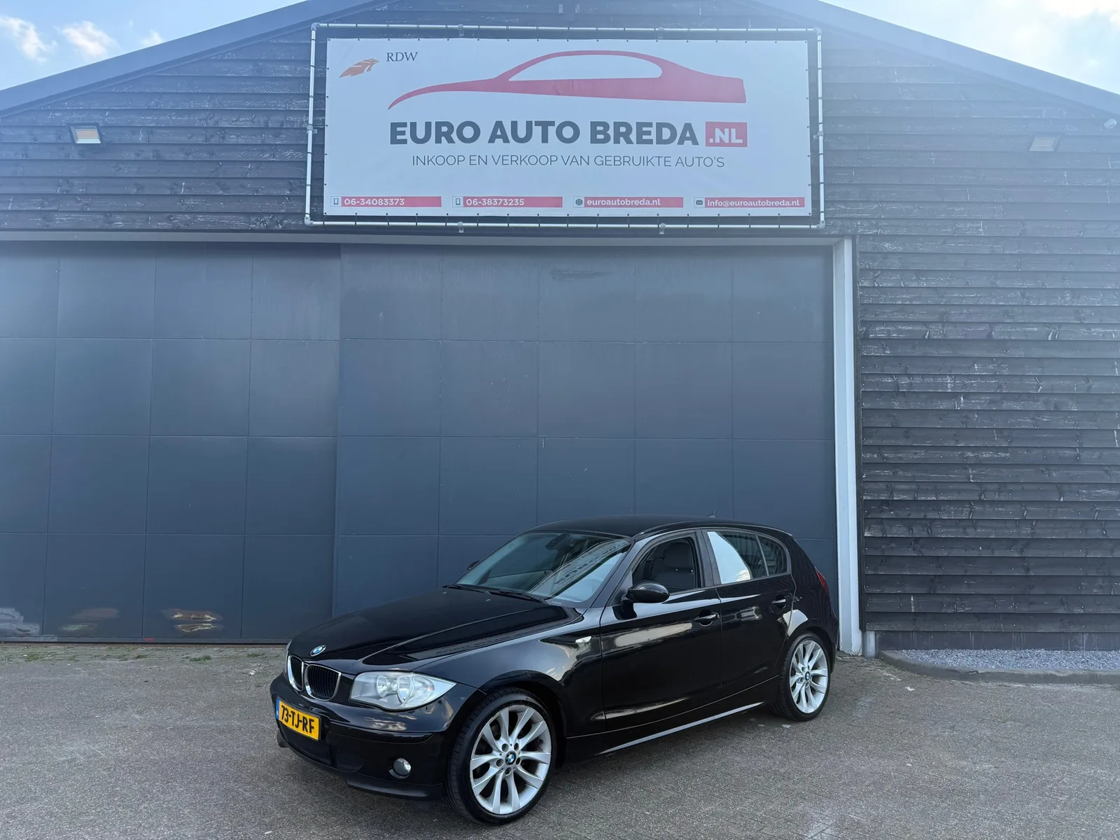 BMW 1-Serie (2006) — foto 1