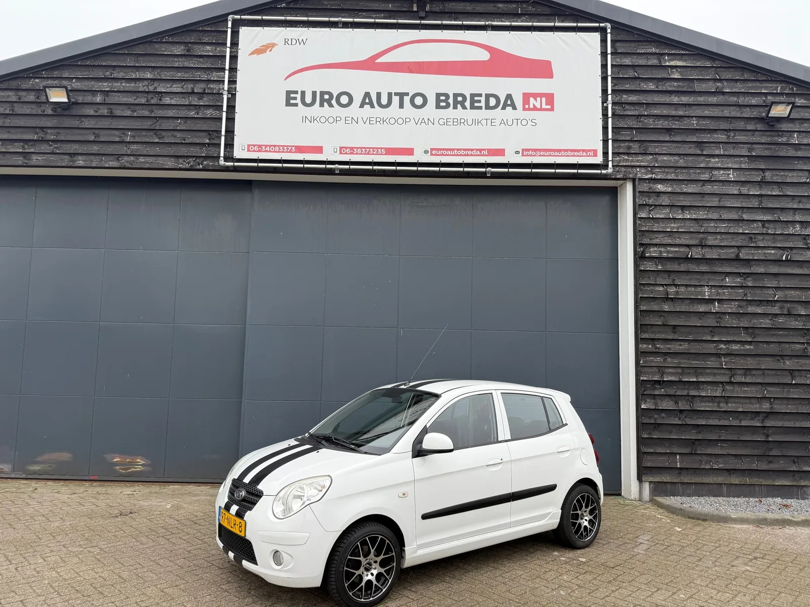 Kia Picanto (2011) — foto 1