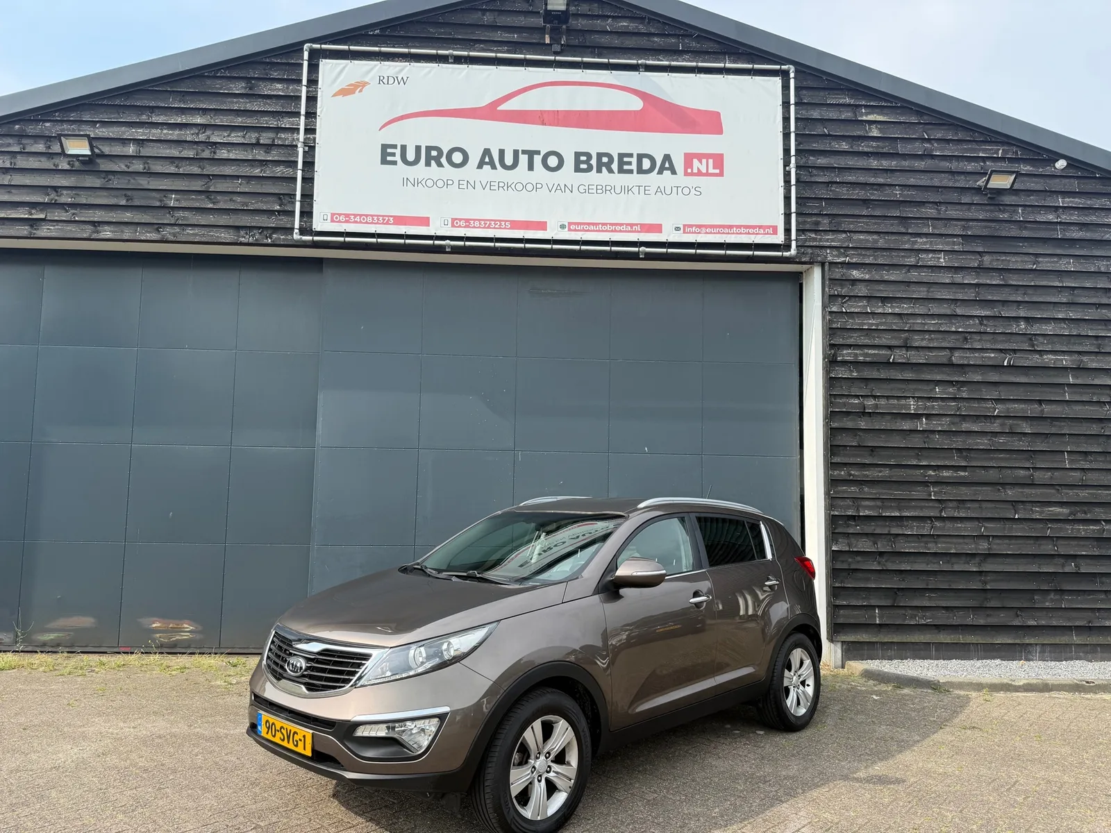 Kia Sportage (2012) — foto 1