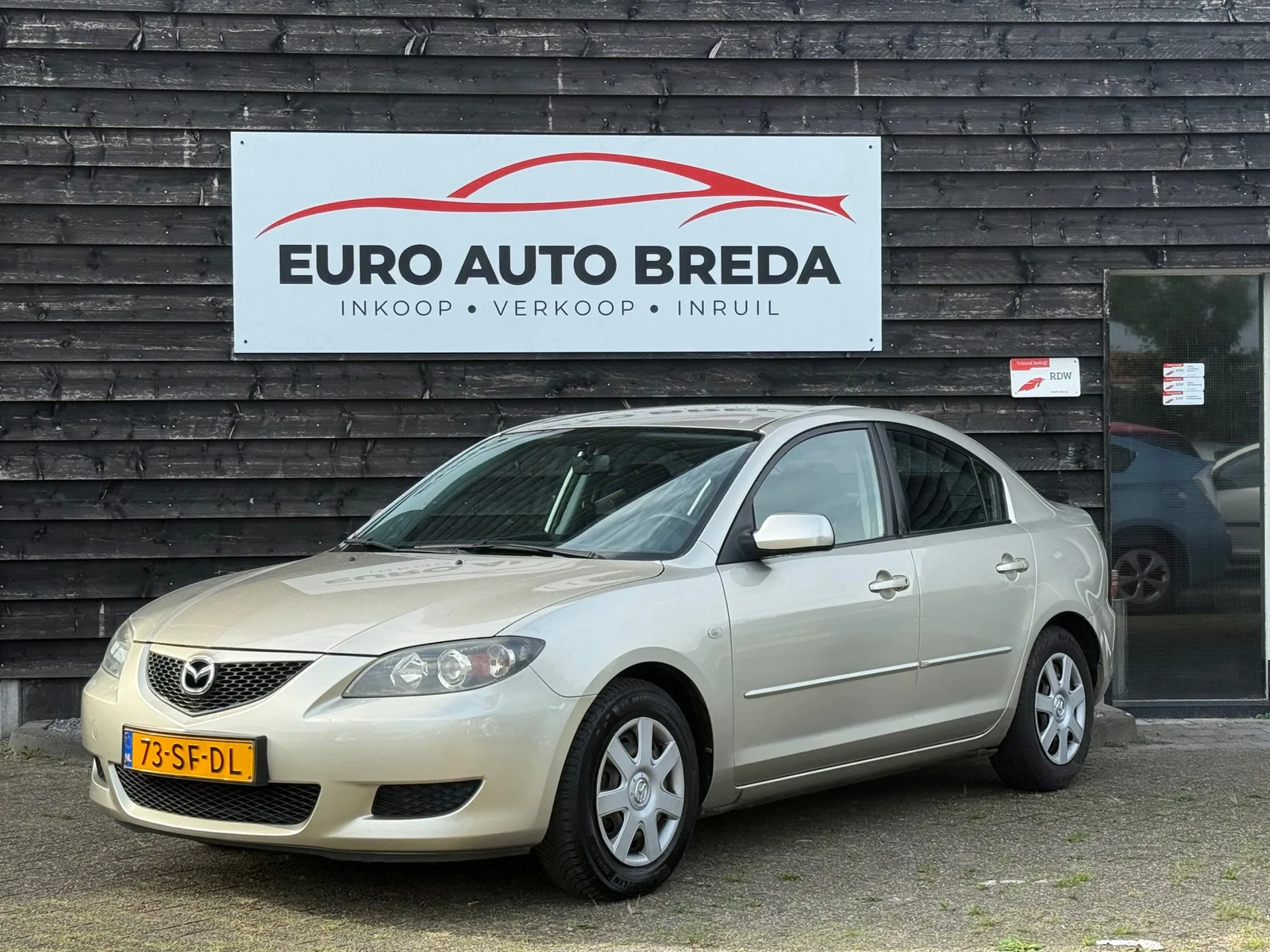 Mazda 3 (2005) — foto 1
